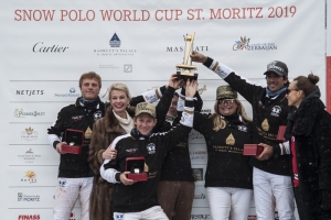 27th January 2019, Lake of St Moritz, St Moritz, Switzerland; Snow Polo World Cup final, Badrutts Palace Hotel versus Maserati; Team Badrutts Palace Hotel  celebrate the first place on podium (from L to R) Alfredo Bigatti, Kathy Dobers of Cartier, Juan Bautista Peluso, Melissa Ganzi and Alejandro Novillo Astrada